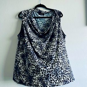 Animal print blouse for businesses and casual look.